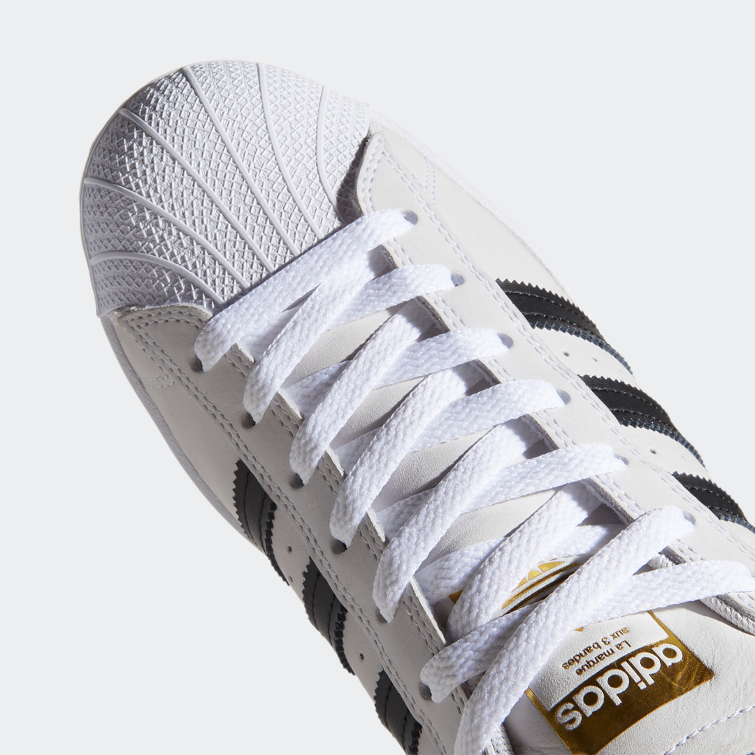 Adidas superstar store metallic grijs